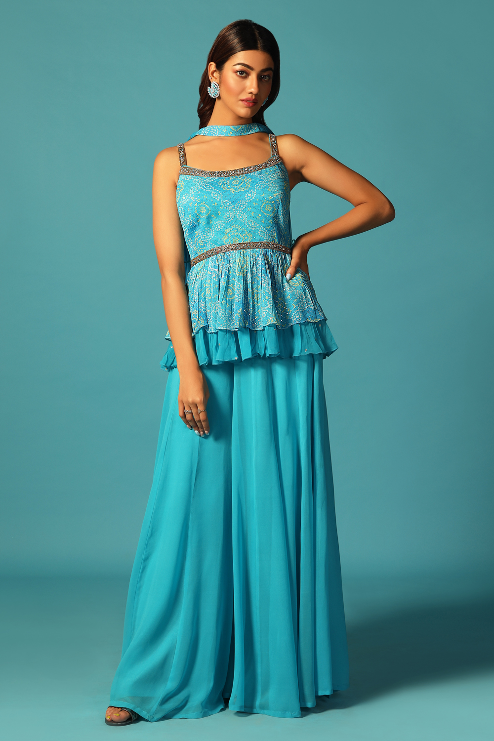 BLUE PALAZZO PANT SET WITH A SOFT PEPLUM STYLE BANDHANI BANDHEJ TOP PAIRED  WITH A MATCHING NECKLACE STYLE DUPATTA AND SILVER EMBELLISHMENTS - Seasons  India