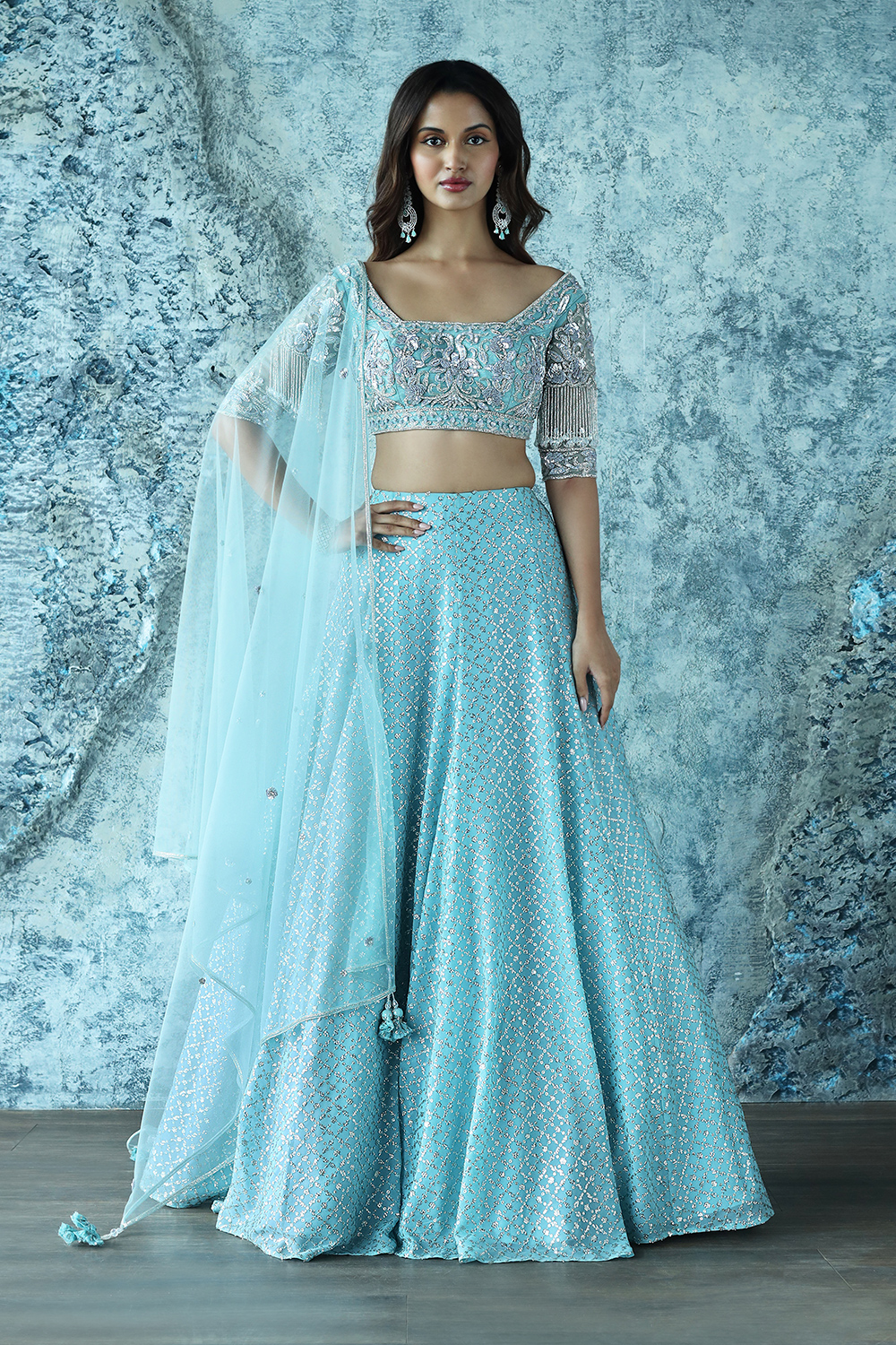 Buy Frozen Blue Lehenga With Multi Colored Hand Embroidered Floral Buttis  And Heavy Embroidered Choli Online - Kalki Fashion
