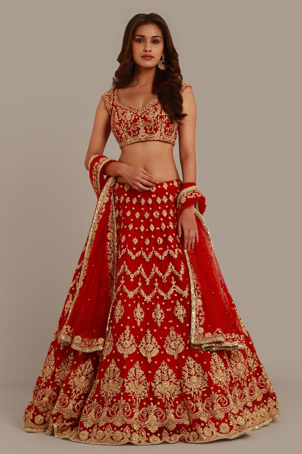 FIERY RED LEHENGA SET WITH MULTI COLOURED THREAD WORK AND SILVER HIGHLIGHTS  PAIRED WITH A CORSET CUT BLOUSE AND A MATCHING DUPATTA. - Seasons India