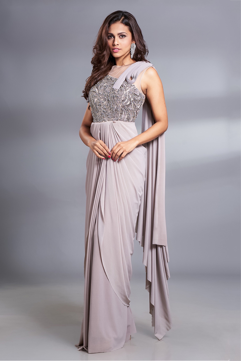 STONE GREY DRAPED SAREE GOWN WITH A HAND EMBROIDERED METALLIC WORK BODICE  AND A 3D DETAILED ATTACHED PALLU  Seasons India