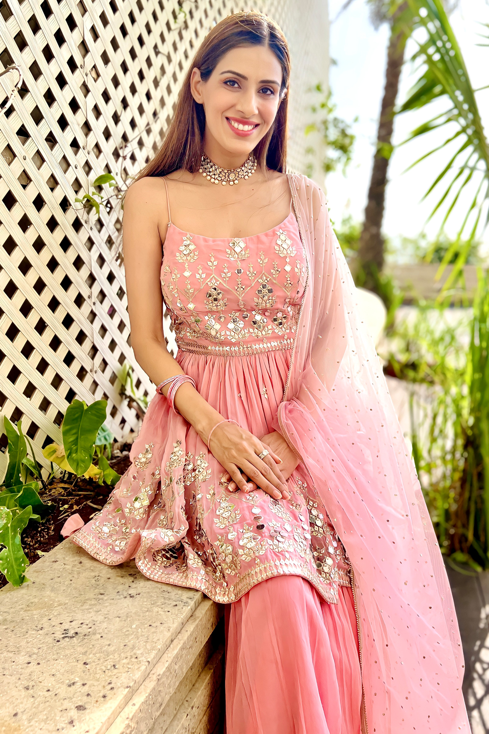 SWEET PINK SINGLE TIERED SHARARA PANT SET WITH AN ABLA EMBROIDERED SOFT  PEPLUM STYLE TOP PAIRED WITH A MATCHING DUPATTA AND GOLD EMBELLISHMENTS   Seasons India