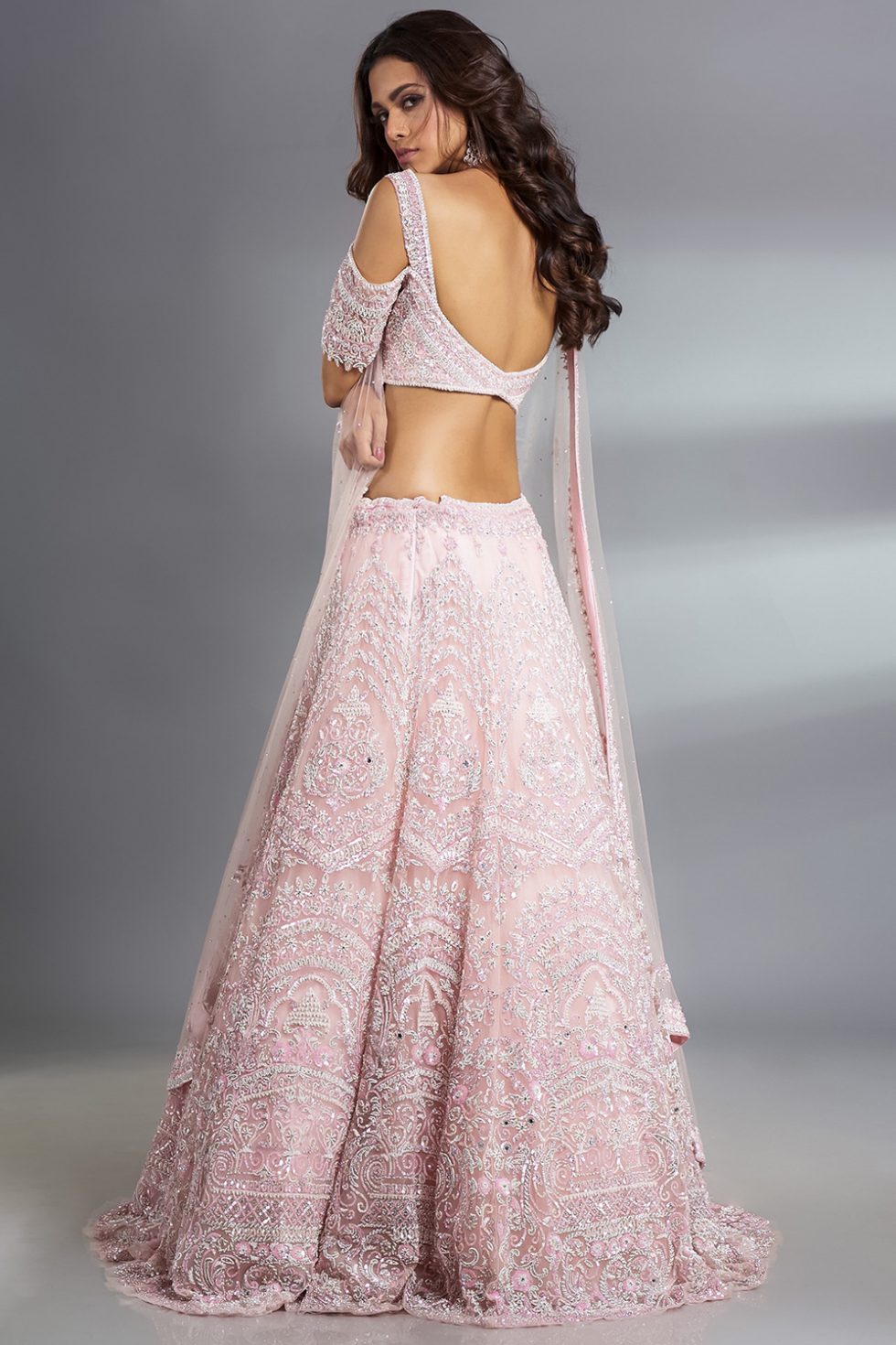Rose pink embroidered off shoulder blouse and lehenga skirt set available  only at Pernia's Pop Up Shop. 2023